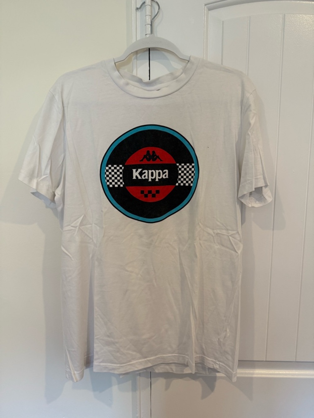 Kappa White Tee with Red, Black & Teal Emblem